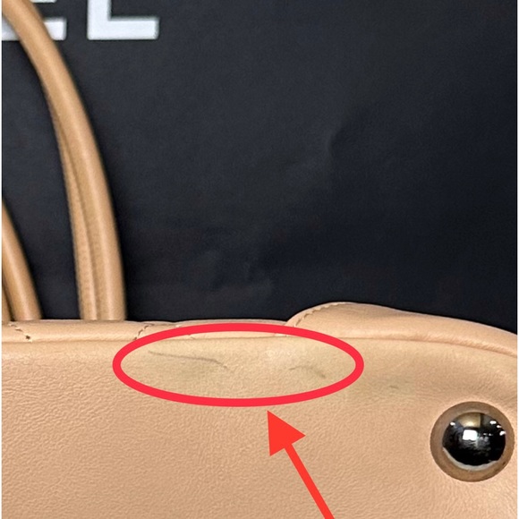 ๐๐ป๐๐ฉAuthentic CHANEL Beige Quilted Lambskin Leather Cambon Tote Bag. - Picture 16 of 17